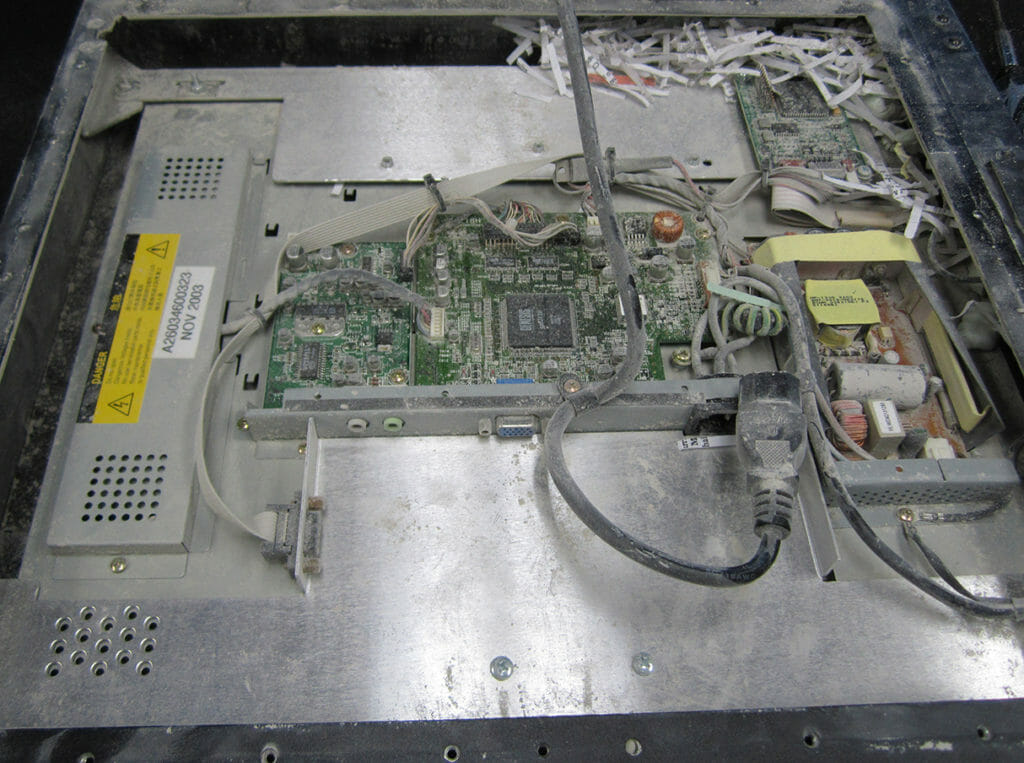 Dust damage in a non-IP66 rated industrial monitor